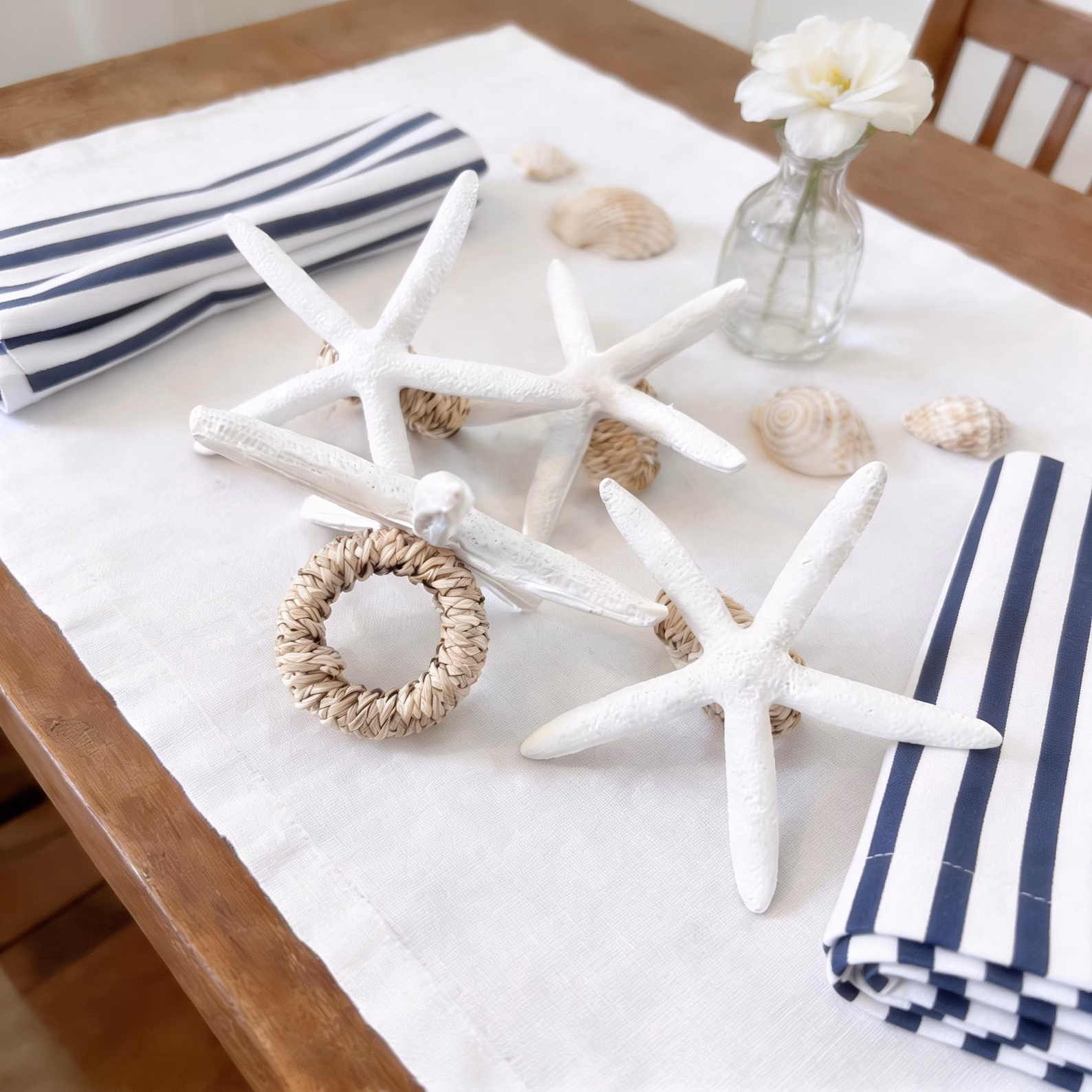 Handmade Starfish Napkin Rings on Woven Rattan (Set of 4)