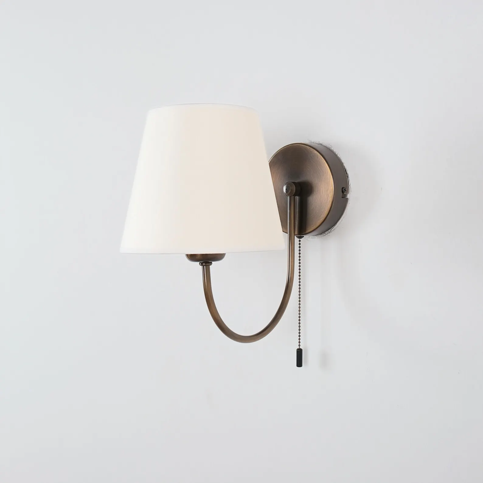 Modern Bedroom Wall Sconce — Aged Brass with Ivory Linen Shade & Pull Chain